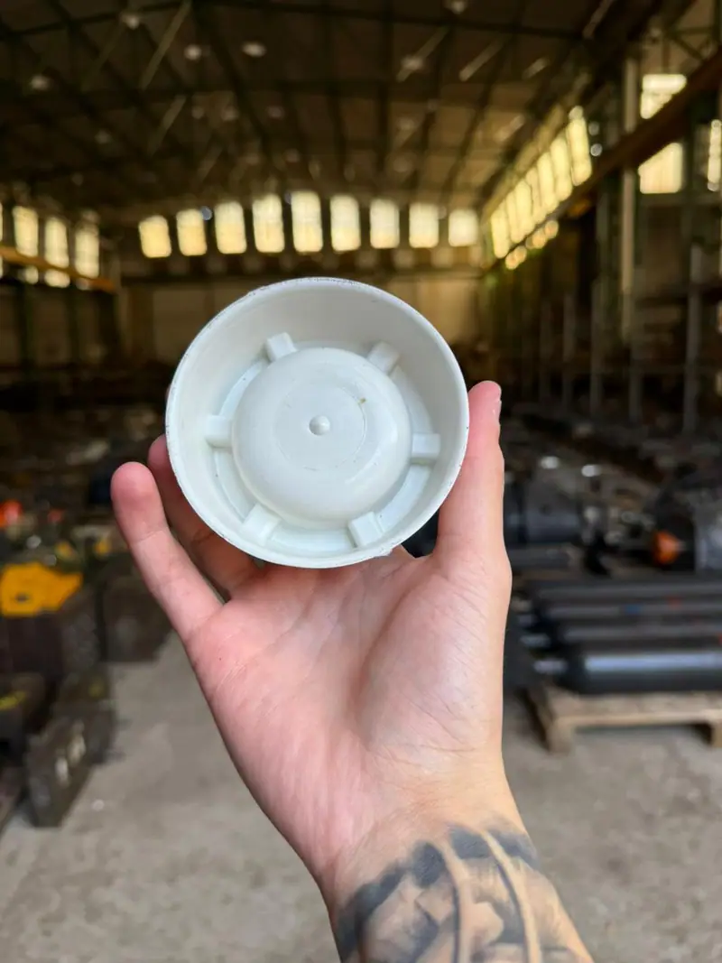 Plastic part injected from the mold for an ashtray — detail 2