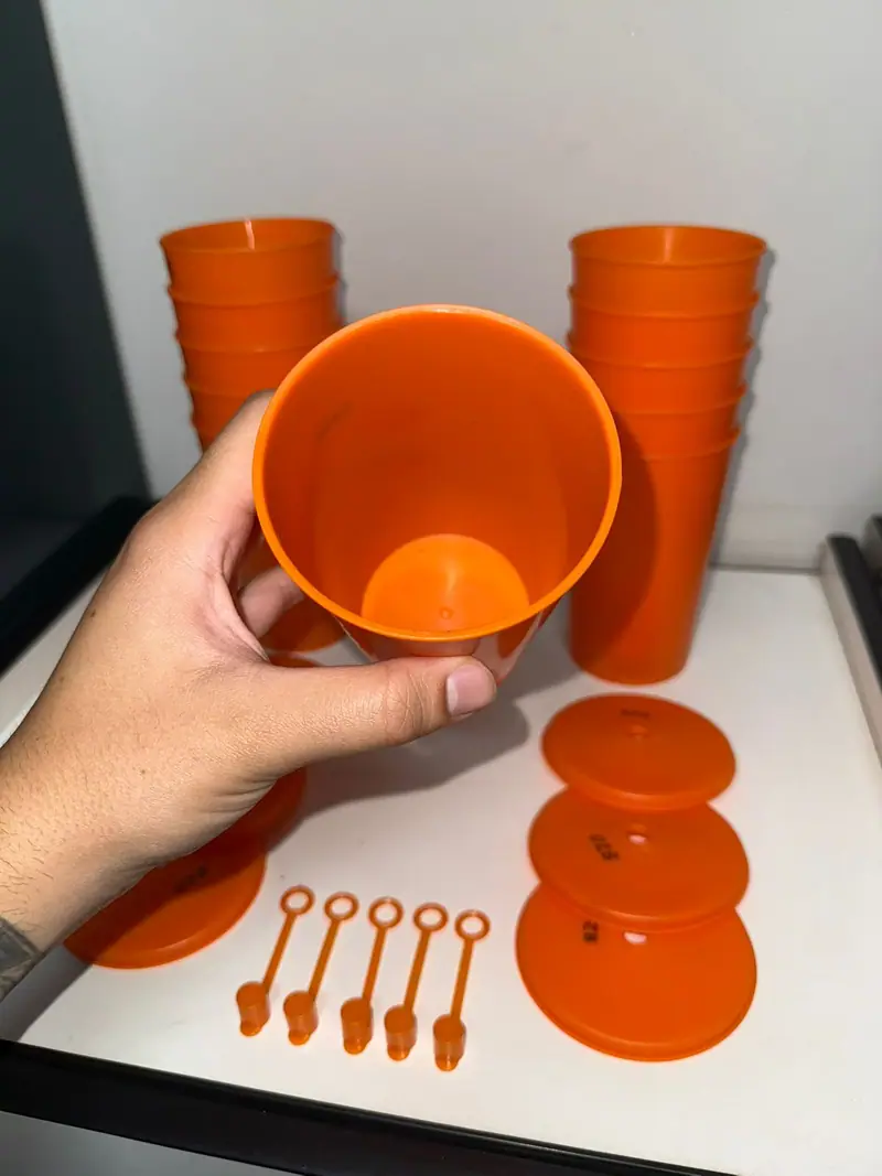 Plastic part injected from the mold for a 660 ml cup with lid and overcap — detail 3
