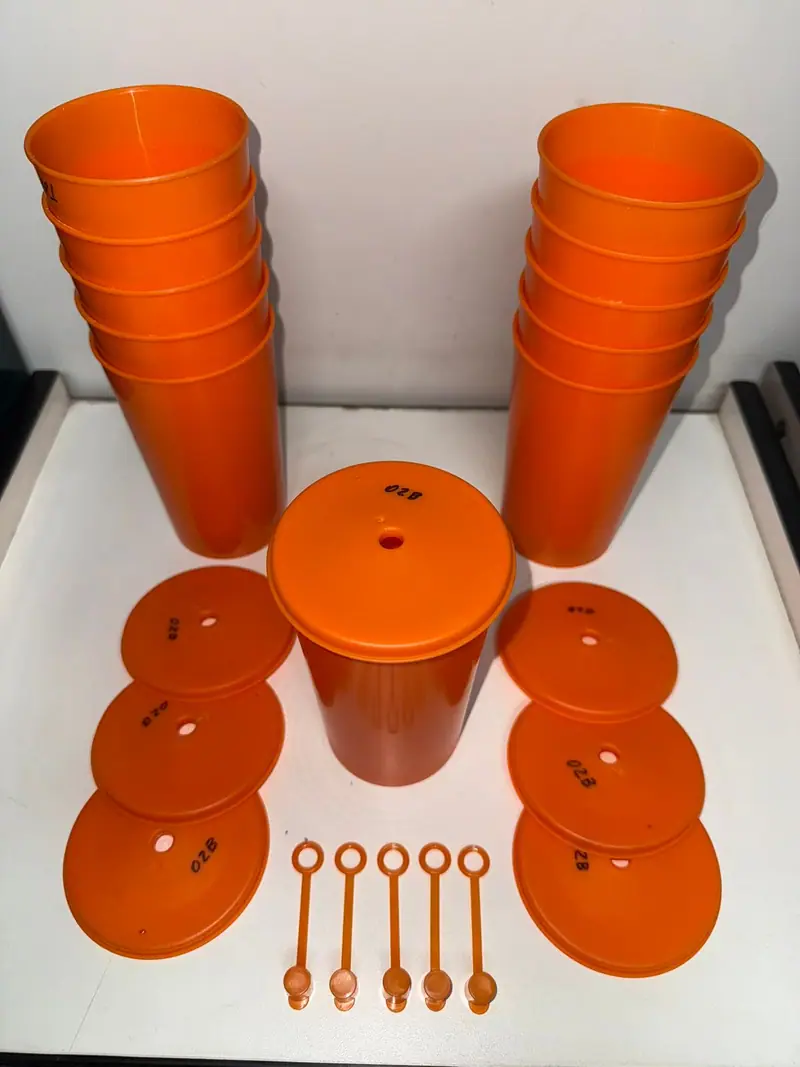 Plastic part injected from the mold for a 660 ml cup with lid and overcap — detail 5