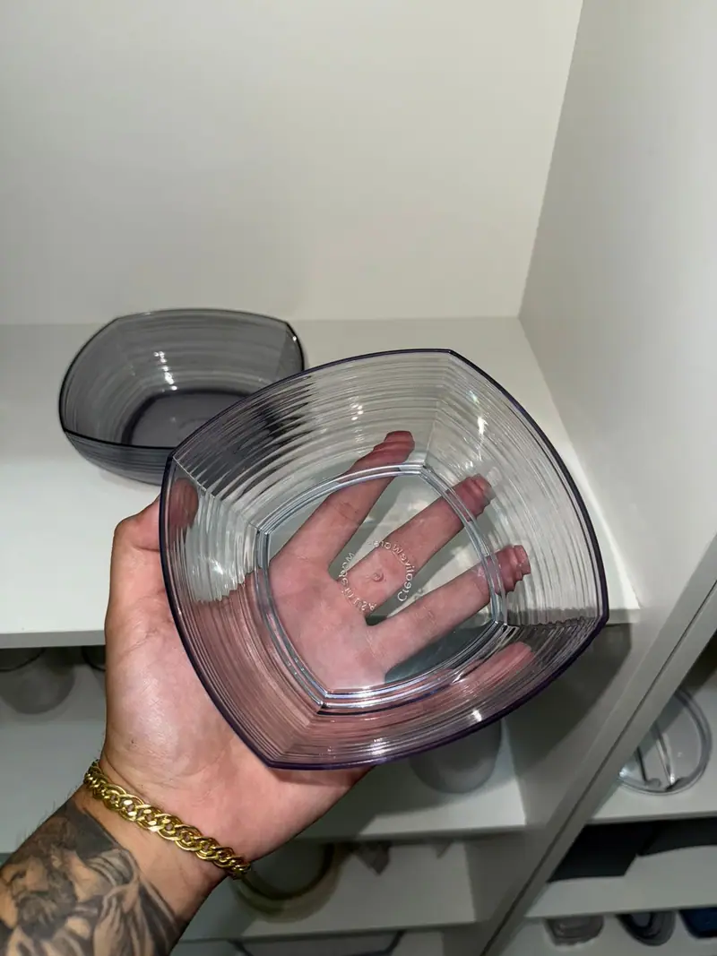 Plastic part produced by the mold for a container